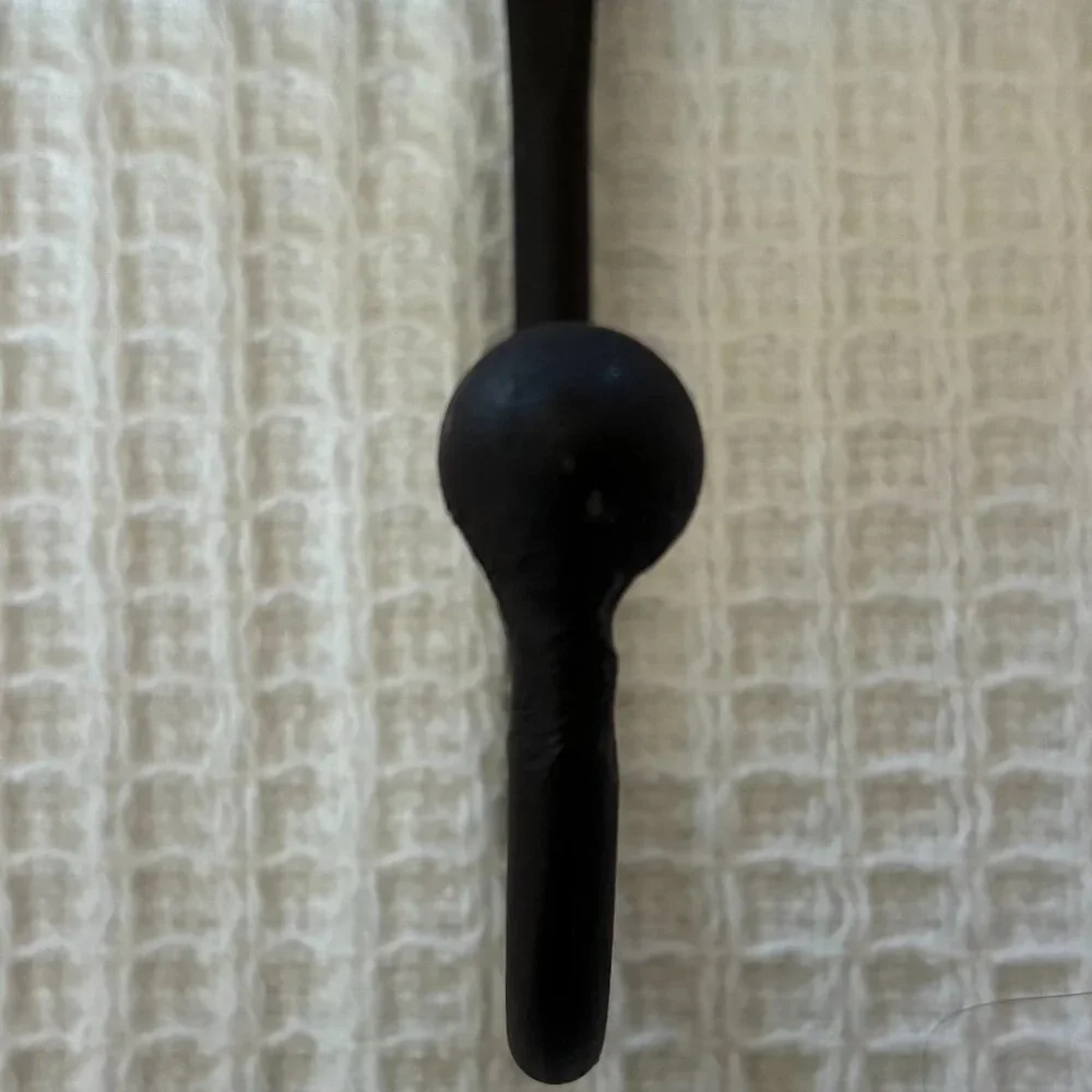 Two Italian marble dog-themed wall hooks